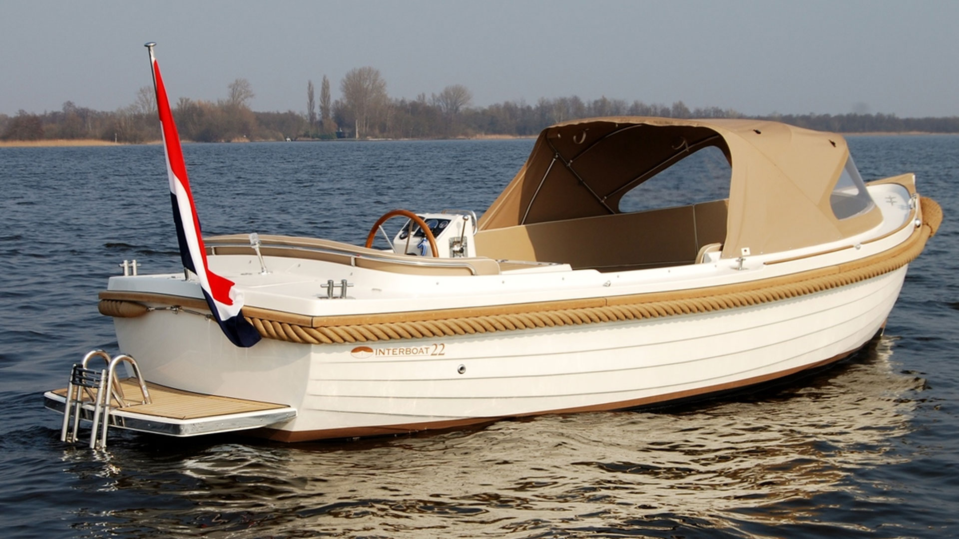 View of a large rental sloop near the city of Amsterdam